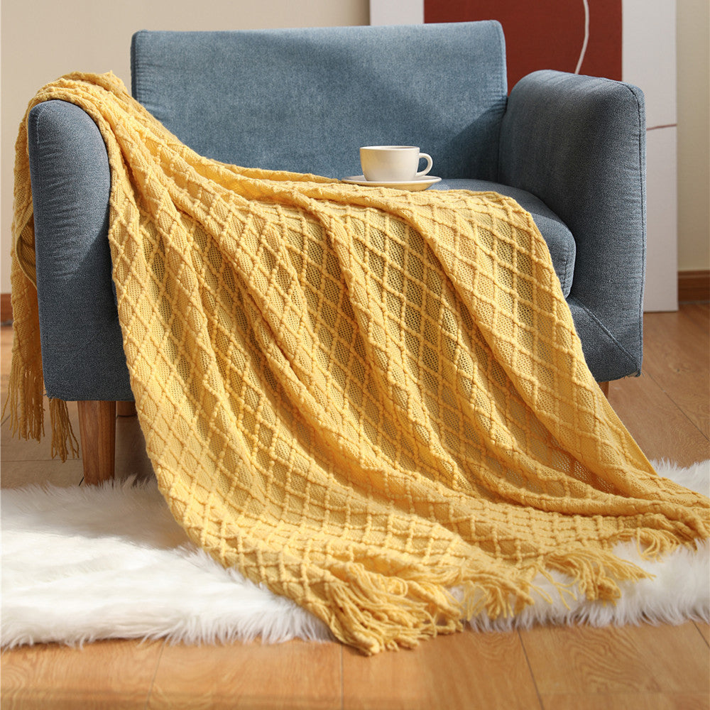 Gemütliche Strickwurfdecke