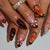 Kunstnagelset mit floralen und kreativen Verzierungen Brehn