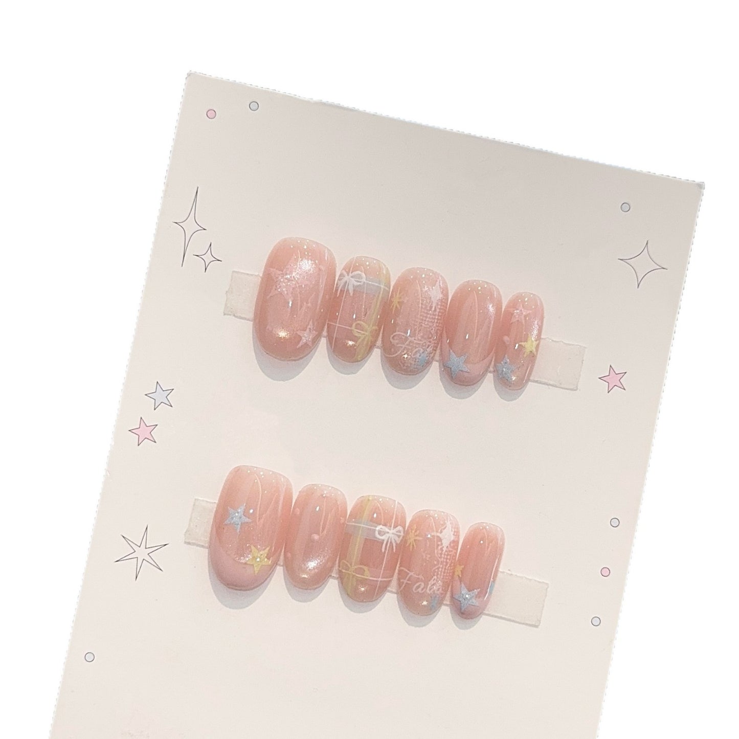 Kunstnägel mit Romantischen Sternen- und Glitzermotiven Brehn