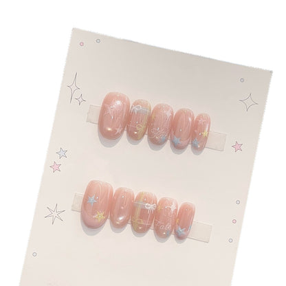 Kunstnägel mit Romantischen Sternen- und Glitzermotiven Brehn