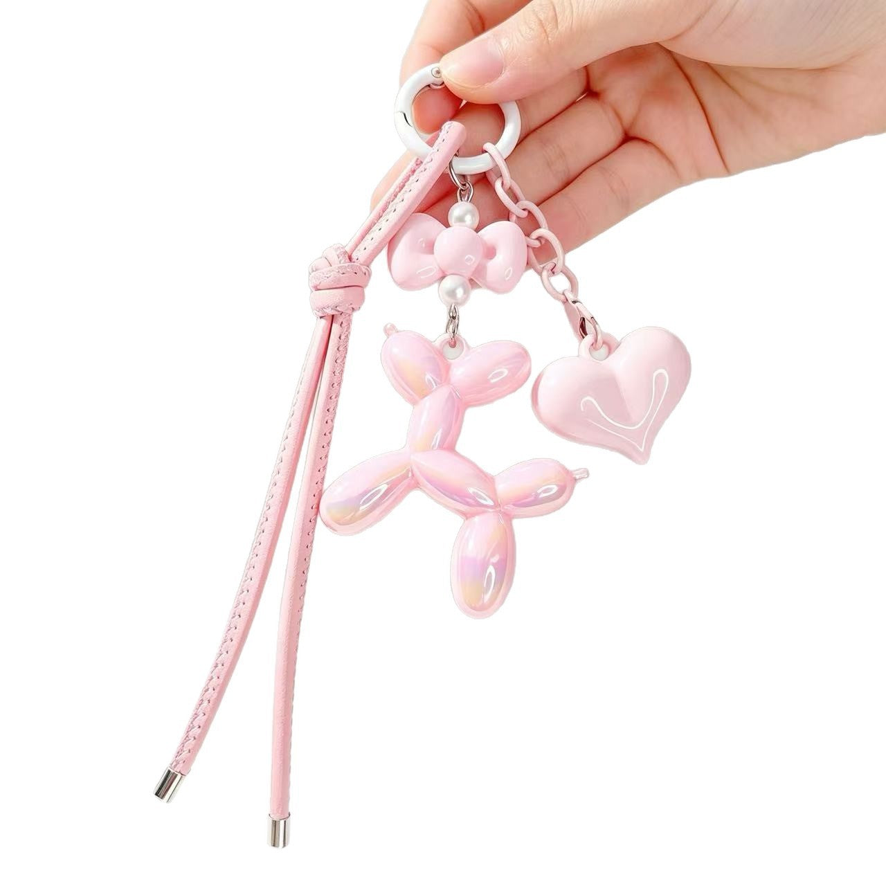 Verspielter Schlüsselanhänger mit Herz und Ballonhund Brehn