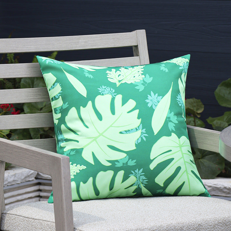 Quadratischer Outdoor-Kissenbezug aus wasserabweisendem Polyester mit tropischem Monstera-Print Brehn