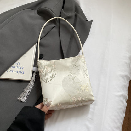 Elegante floral bedruckte Handtasche