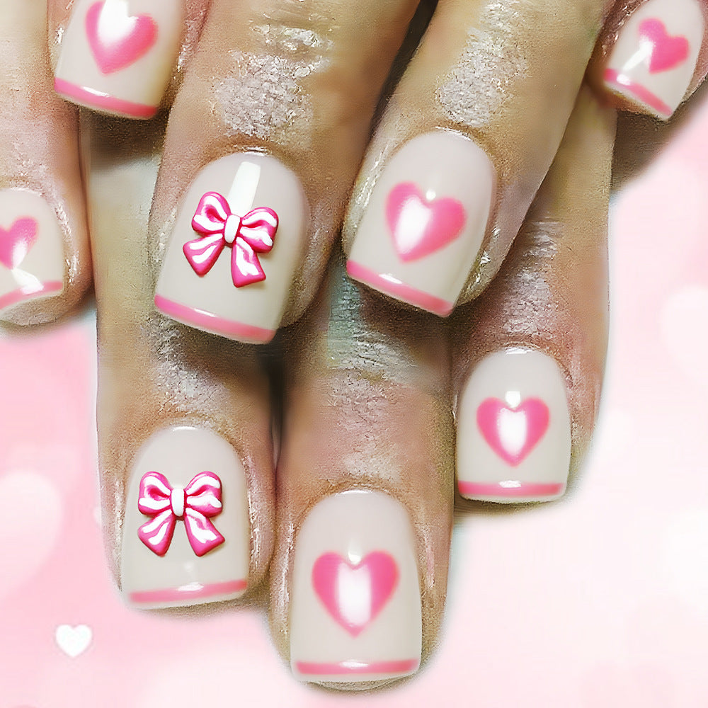 Herz und Schleife Verzierter Press-On Nagelkunst Brehn