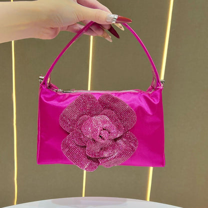Blumenverzierter Handtasche
