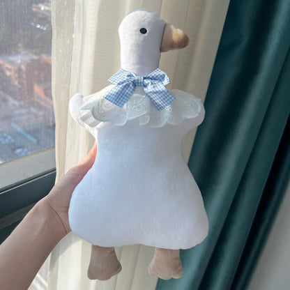 Plüsch-Ente Komfortkissen mit Gingham Schleife