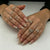 Elegantes Press-On-Nagelset mit goldenen Akzenten Brehn