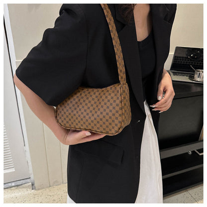 Stylische karierte Schultertasche