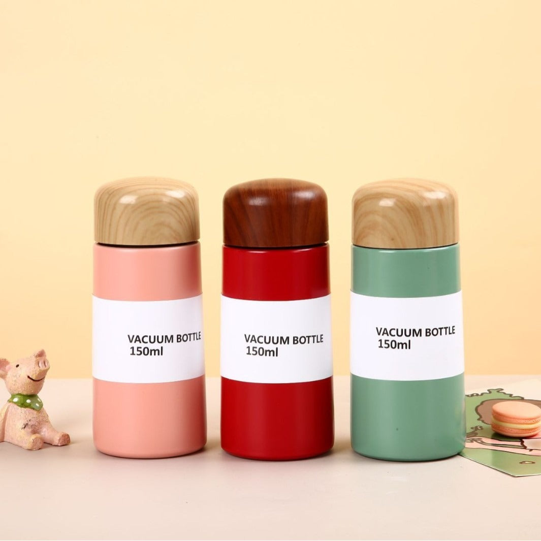 Damen vakuumisolierte Wasserflasche mit innovativem Holzdeckel Brehn