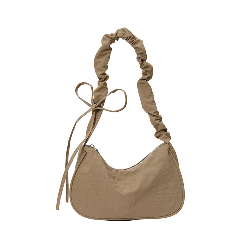 WoTexturiertes Stoff Sling Bag Brehn