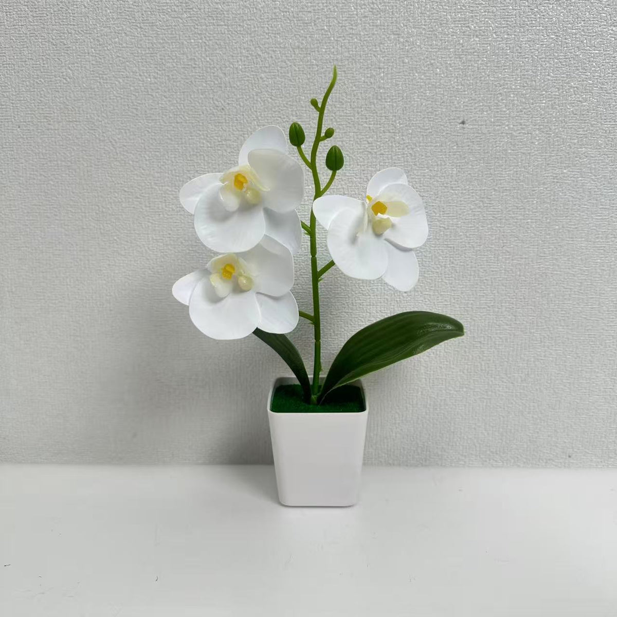 Dekorative künstliche Orchideenpflanze für die Wohnkultur展示
