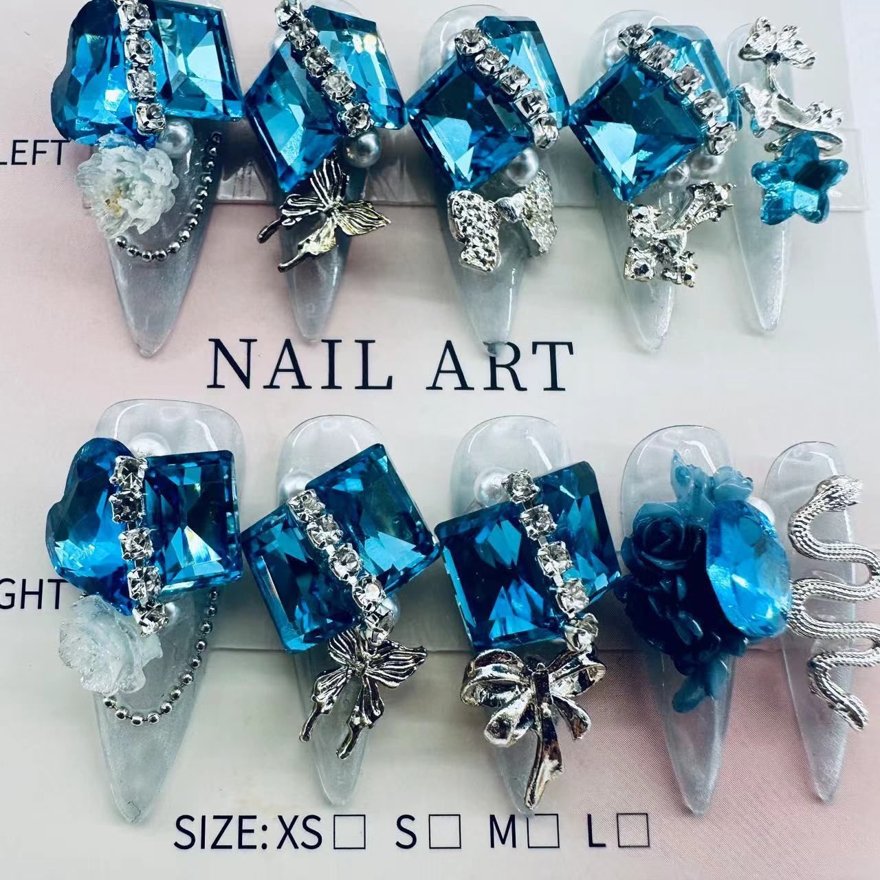 Glamouröse Nagelkunst mit Kristall- und Perlenakzenten Brehn