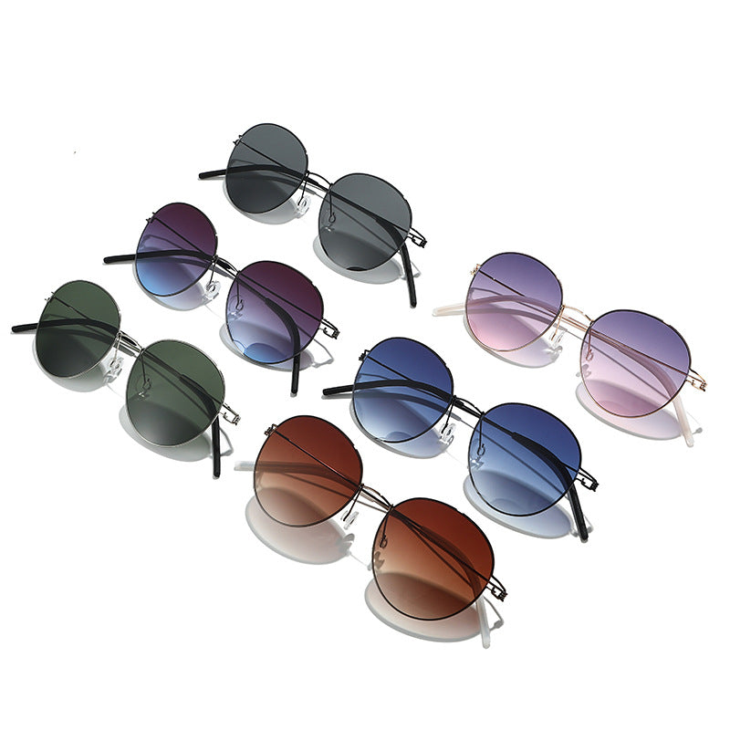 Damen runde Sonnenbrille mit leichtem Metallrahmen und gradienten Gläsern Brehn