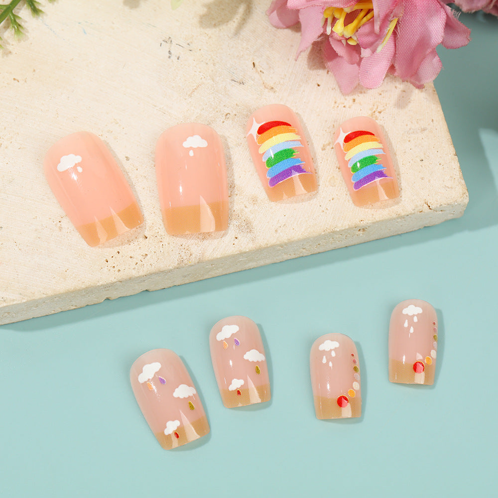 Kreatives Kunstnägel Set mit Regenbogen- und Wolkenmotiven Brehn