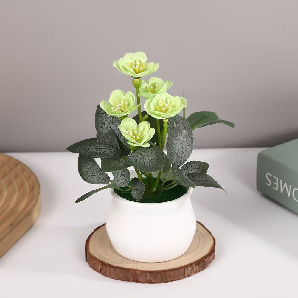 Künstliches Blumenarrangement für die Wohnkultur展示