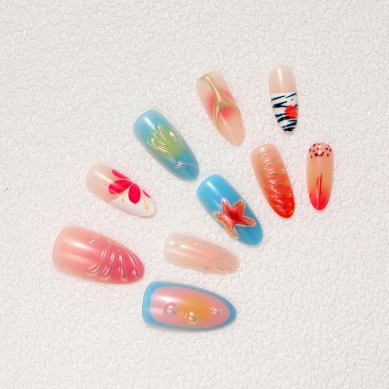 Kunstvolle Nagelspitzen mit maritimen Motiven Brehn