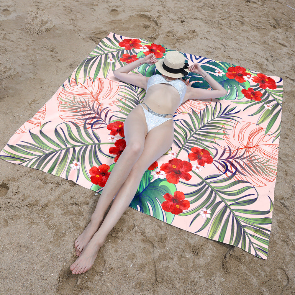 Stranddecke mit lebhaftem Blumenmuster und innovativer Struktur Brehn