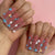 Dekorative Press-On Nagelset mit floralen und Edelsteinakzenten Brehn