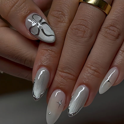 Elegante Stiletto Nagelkunstverlängerungen mit silbernen Akzenten Brehn