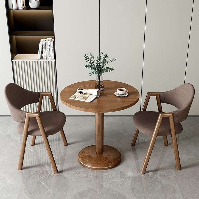 Designertisch mit Marmorplatte und stabiler Metallbasis Brehn