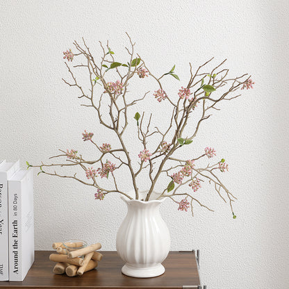Dekorativer Kunstzweig mit detailverliebten Blüten Brehn