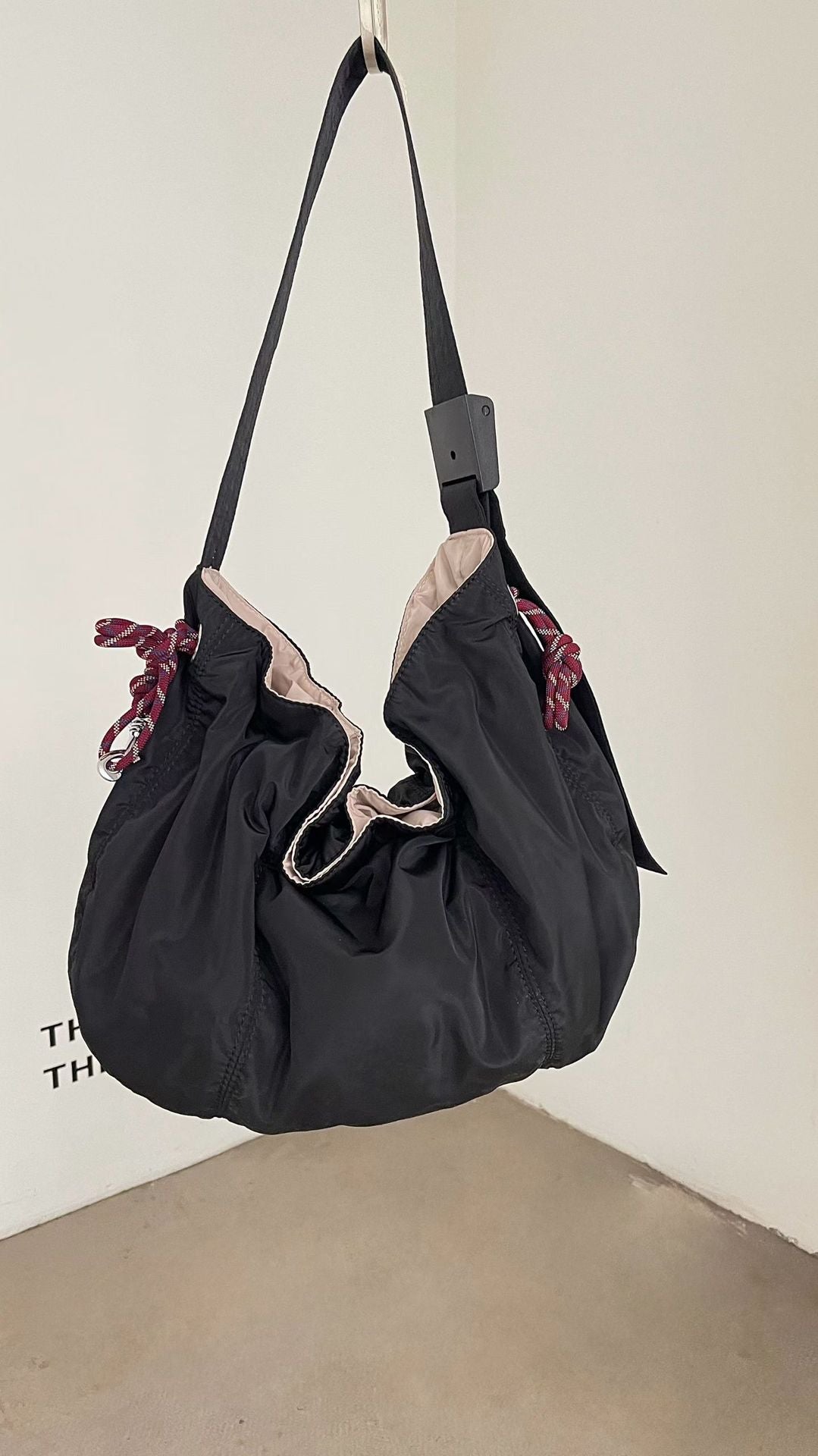 Funktionale Kordelzug-Schultertasche
