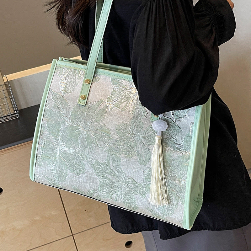 Floral bestickte Handtasche