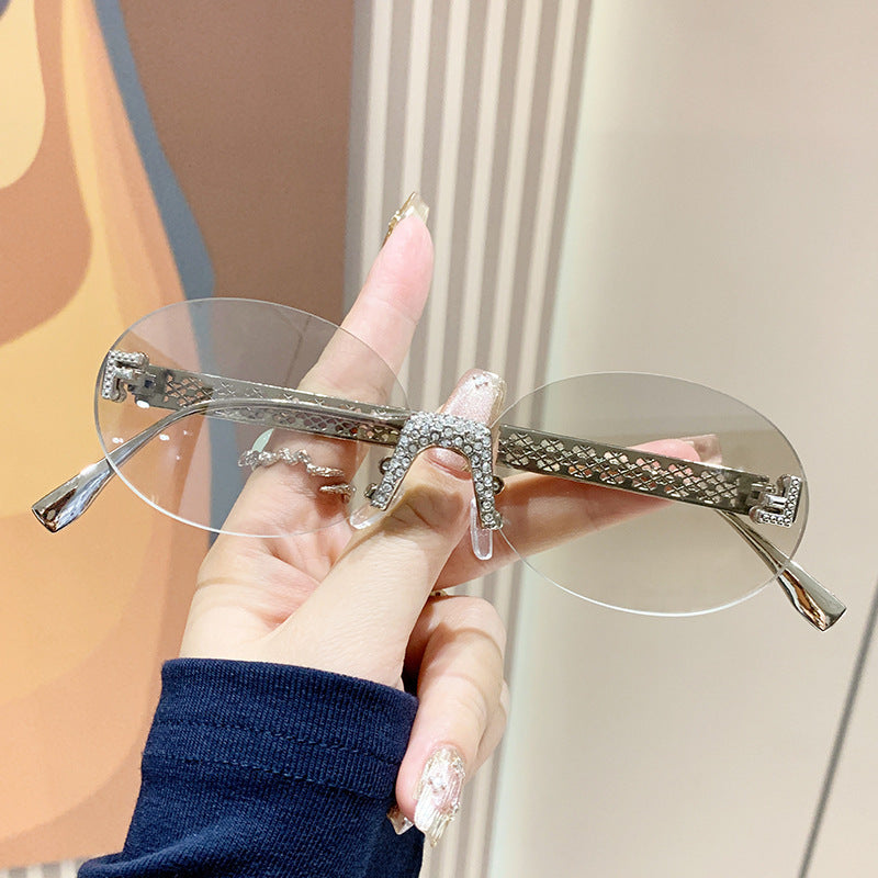 Damen Sonnenbrille mit glitzerndem Rahmen und ovalen Gläsern Brehn
