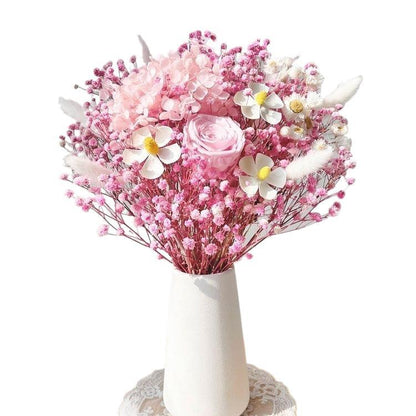 Trockenblumenarrangement in eleganter Vase