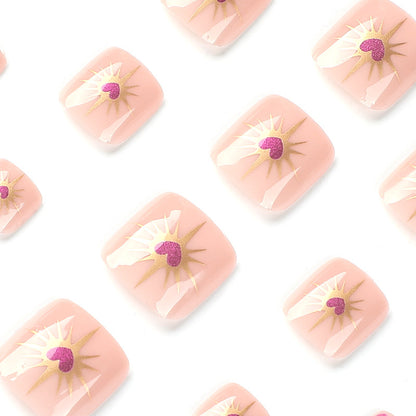 Kunstvolle Fußnagelkunst mit Herz- und Blumendesign Brehn