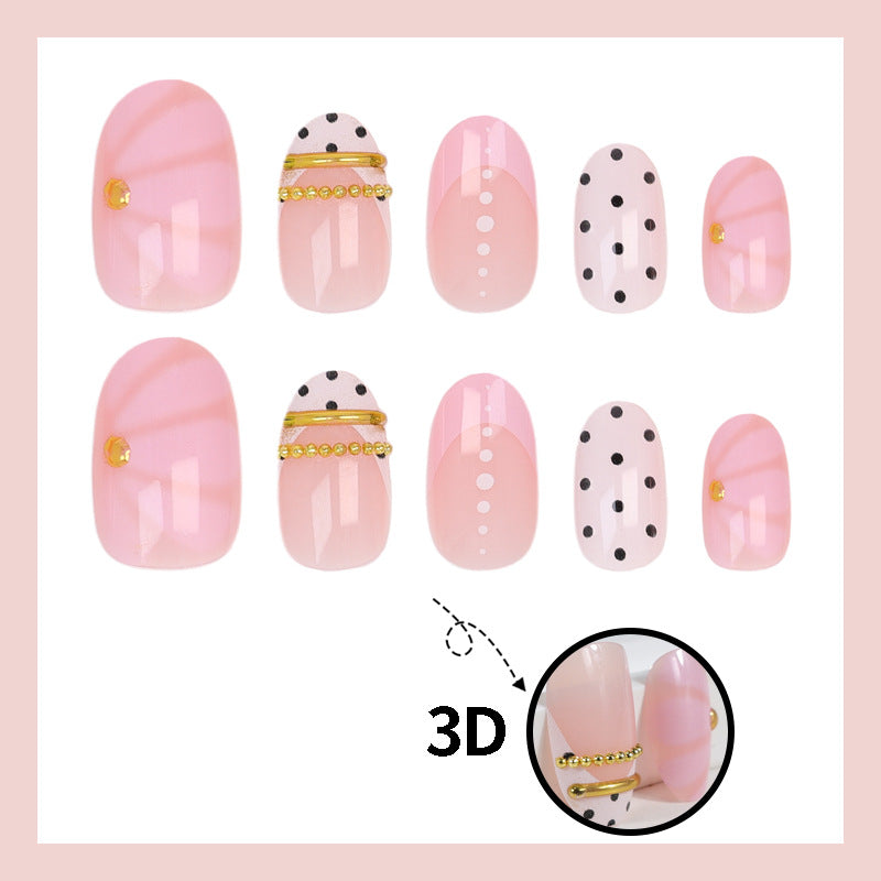 Kunstnagelset mit elegantem Polka-Dot und glamourösen goldenen Akzenten Brehn