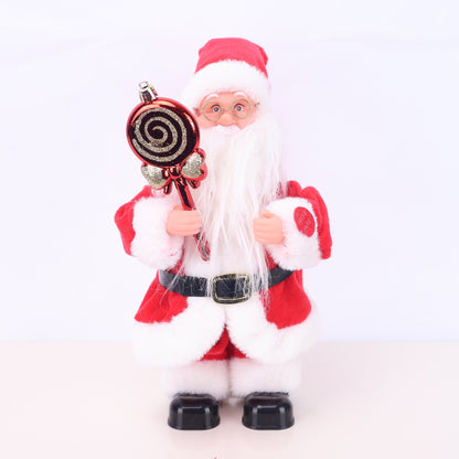 Dekorative Weihnachtsmannfigur mit Süßigkeit