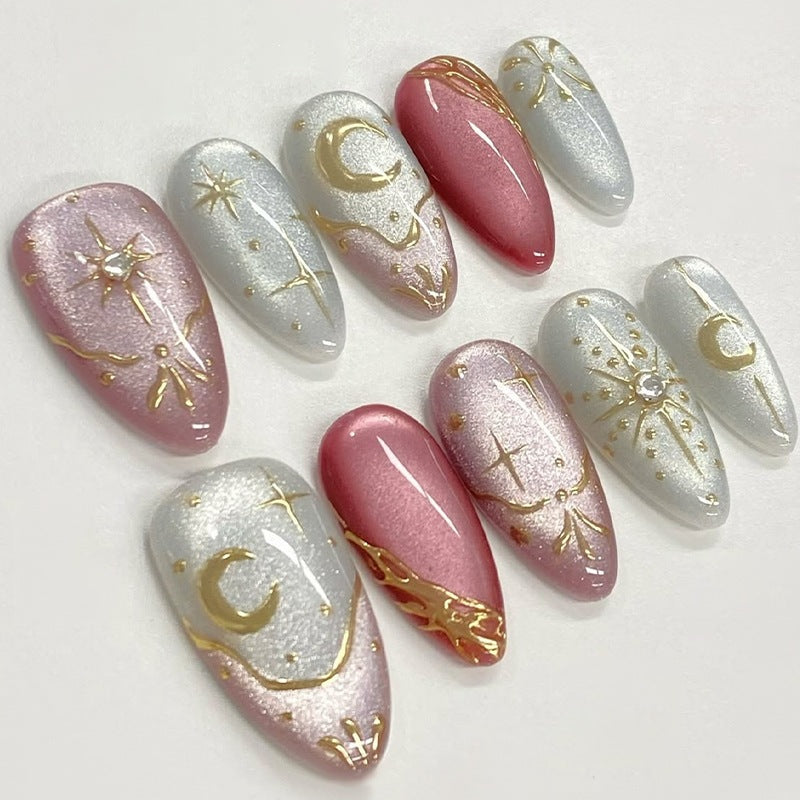 Kunstnagelset mit glamourösen Glitter- und Sternakzenten Brehn