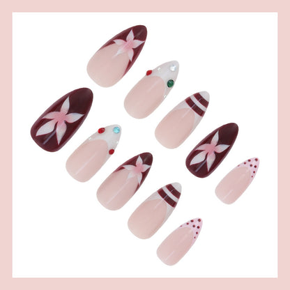 Kunstnagelset mit floralem Design und Glitzerakzenten Brehn