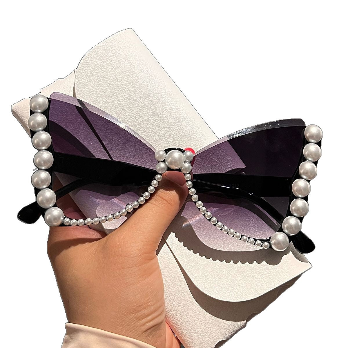 Damen auffällige Sonnenbrille mit Perlenverzierung Brehn