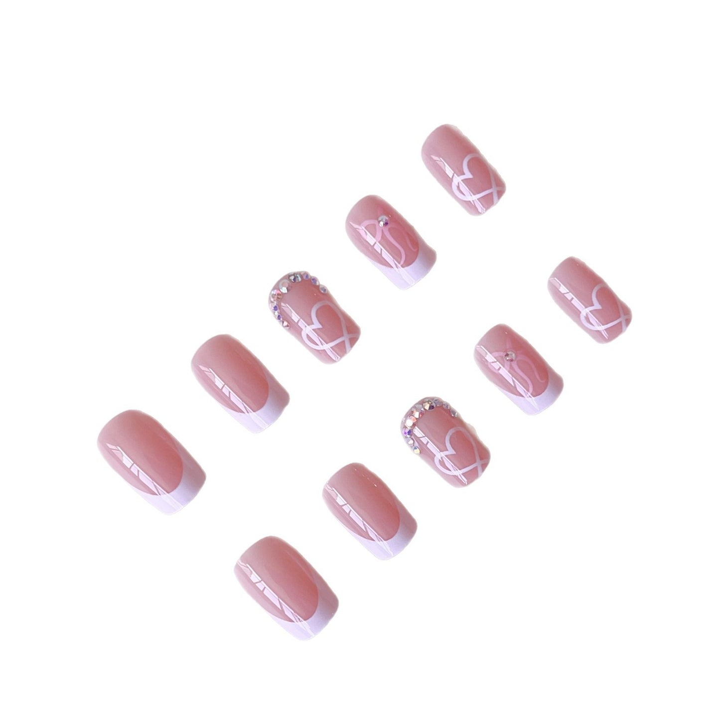 Elegantes Nagelkunst-Set mit Herzmotiven und Strassdetails Brehn
