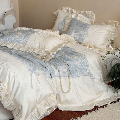 Rüschender Baumwollsatin Bettbezug mit Spitzenbesatz und Schleifenakzenten & dekorativen Kissenbezügen