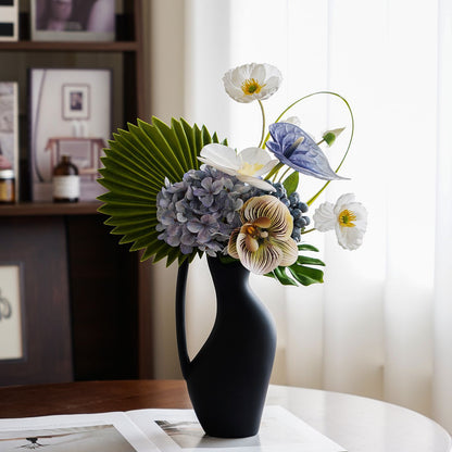 Stylische künstliche Blumenarrangement