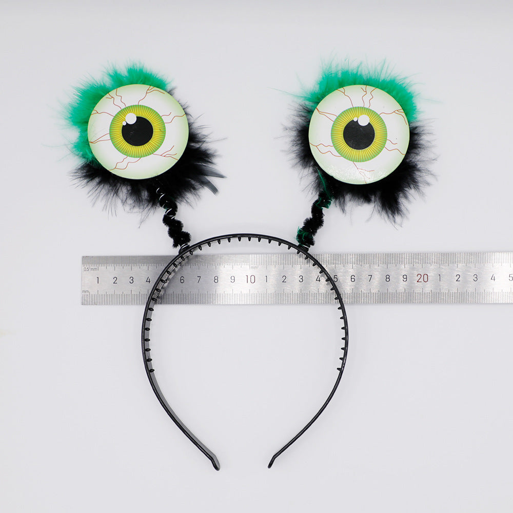 Lustiger Haarreif mit Augenmotiven