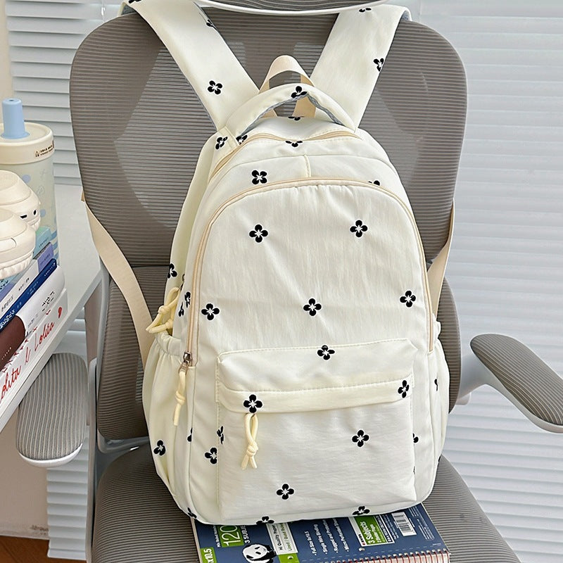 Blumenverzierte leichte Schulrucksack
