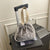 WoTextured Drawstring Mini Tasche Brehn