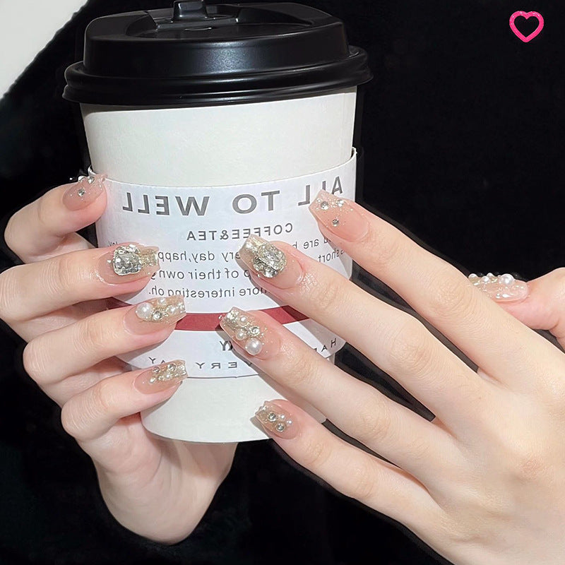 Kunstnagelset mit elegantem Perl- und Glitzerdesign Brehn