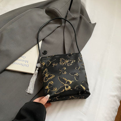 Elegante floral bedruckte Handtasche