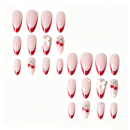 Künstlerisches Kirsch- und Schleifen-Nageldesign
