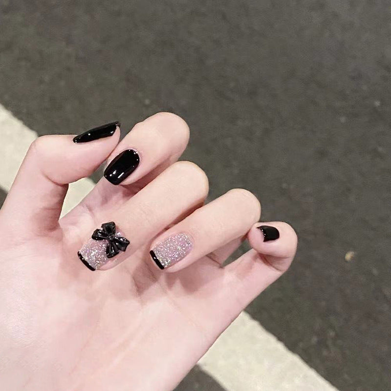 Elegante Stiletto Press-On Nail Set mit dekorativen Schleifenakzenten Brehn