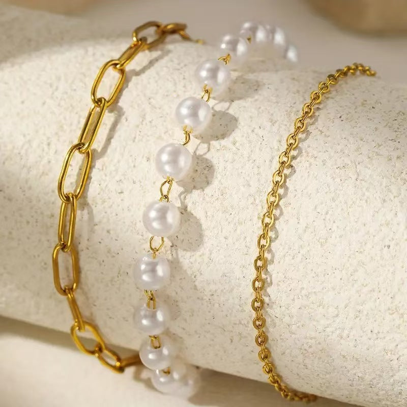 Elegantes Schichten Perlen- und Kettenarmband-Set Brehn