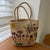 Handgefertigte Stroh-Tasche mit Floralem Stickdesign Brehn