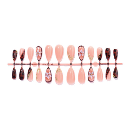 Kunstnagelset mit eleganten floralem Dekor und Glitzerelementen Brehn