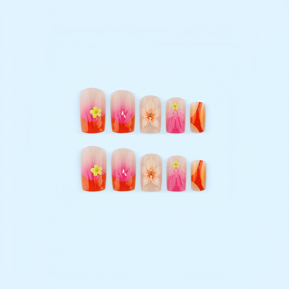 Kreatives Kunstnagelset mit floralen und Ombre-Designs Brehn