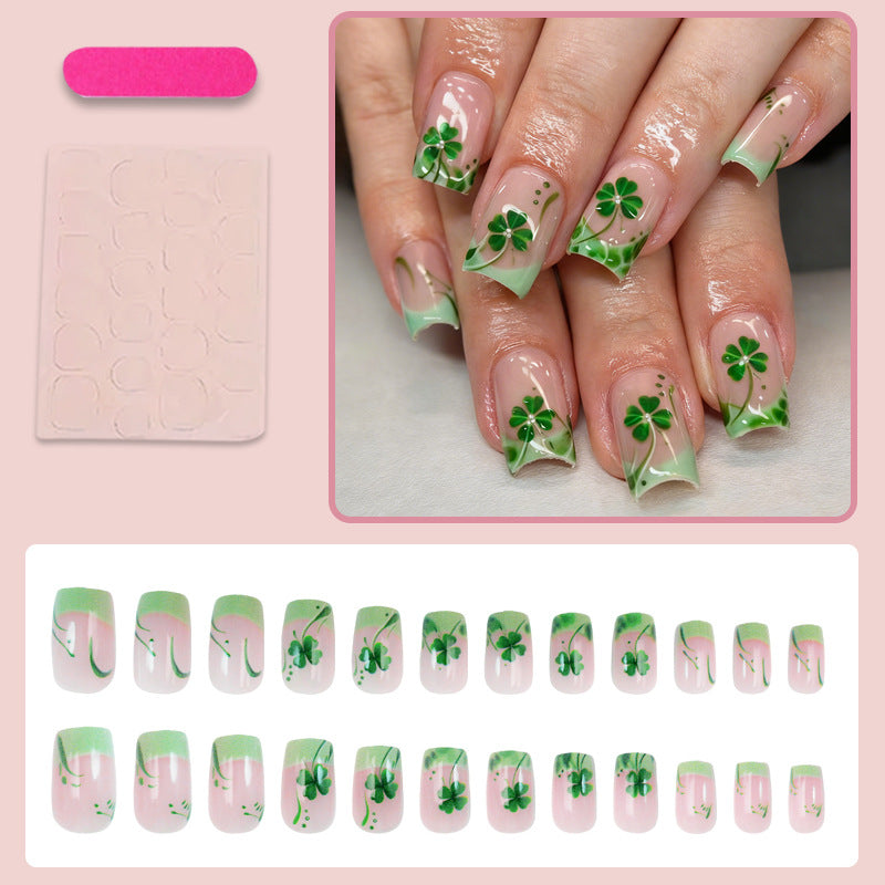 Kunstnagelset mit festlichen Glitzer- und Kleeblatt-Motiven Brehn